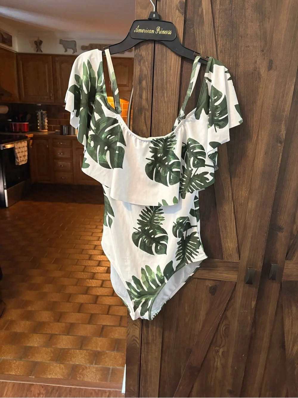 White One-Piece Swimsuit with Green Tropical Leaf Print